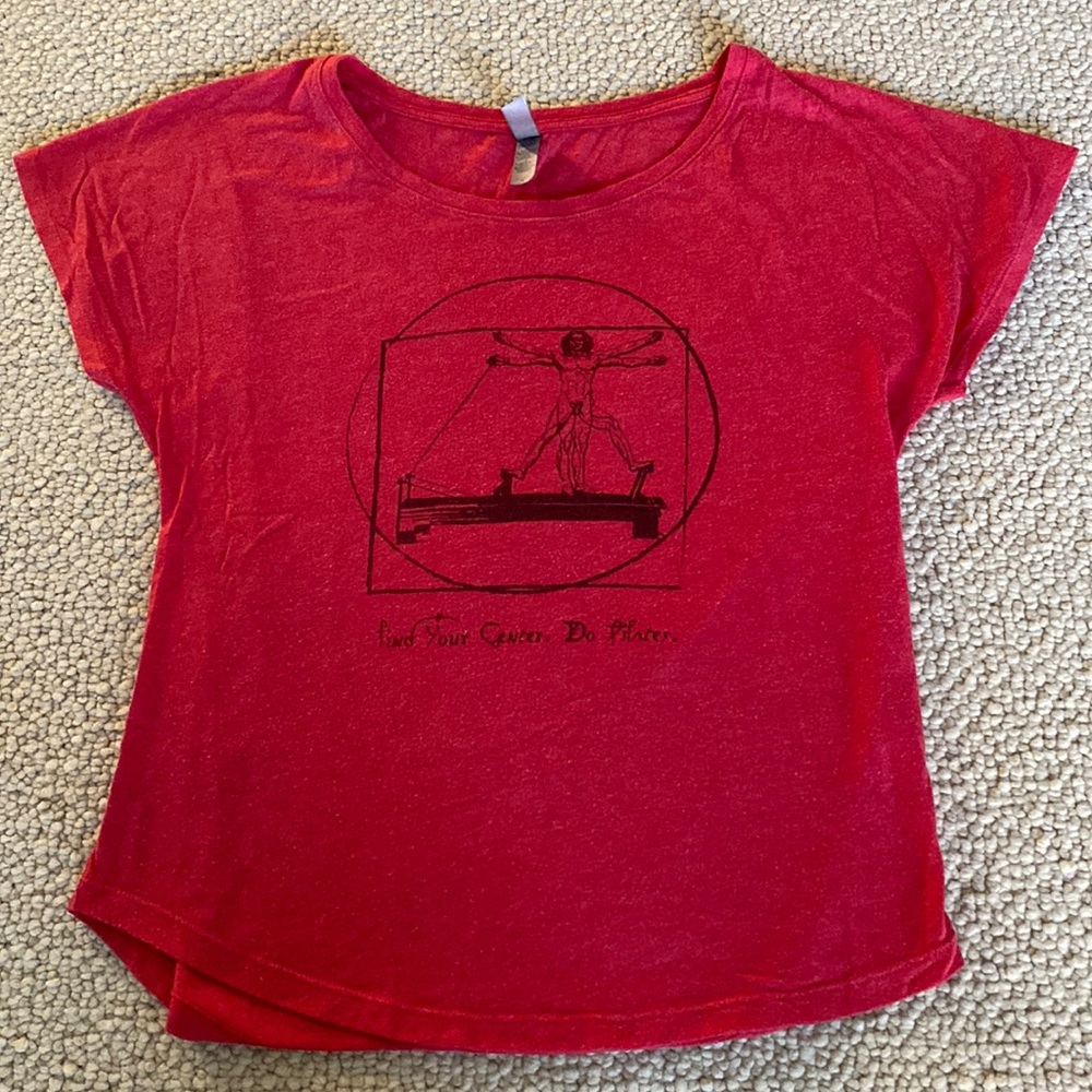 Red soft T- shirt with graphic print.  Size medium